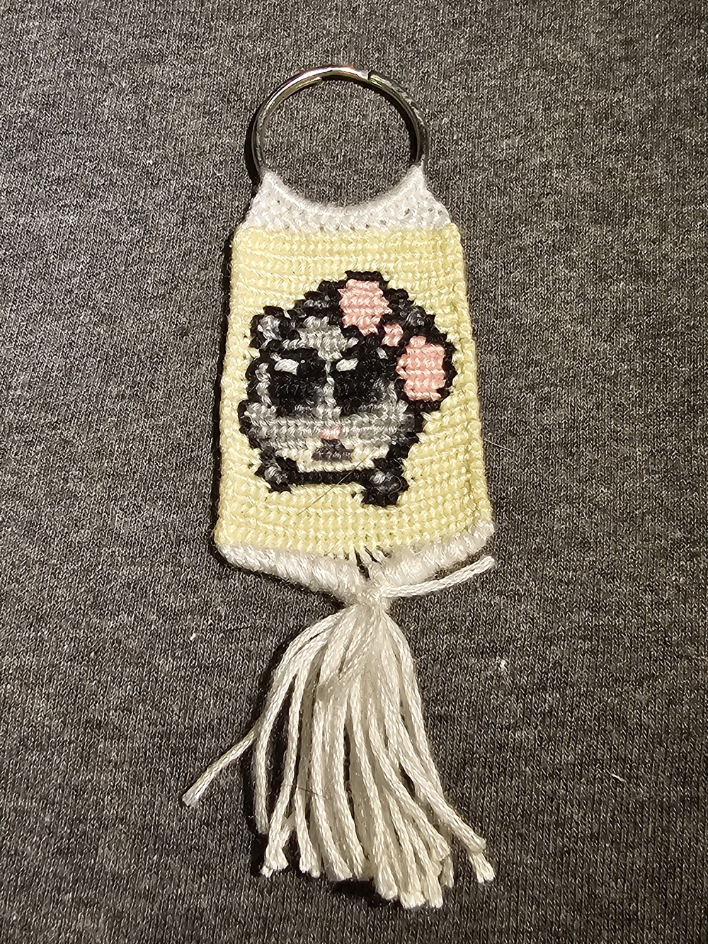Handmade Yellow Keychain with Sad Hamster And Pink Bow Design